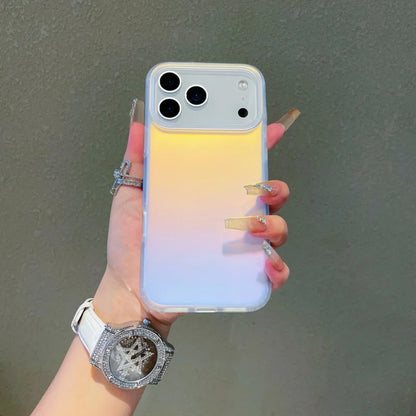 Iphone 17 pro max with a colour changing sunset-sky case without magsafe held in hand