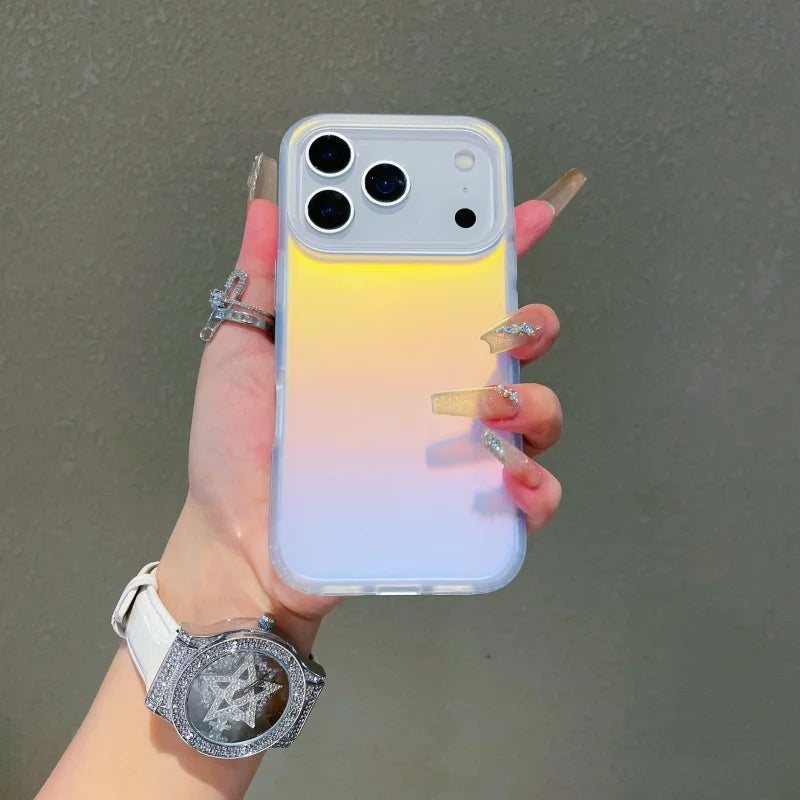 Iphone 17 pro max with colour changing sunset-sky case without magsafe held in hand